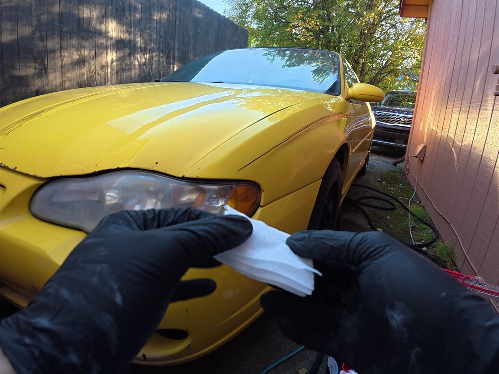 Applying UV sealant to a restored headlight